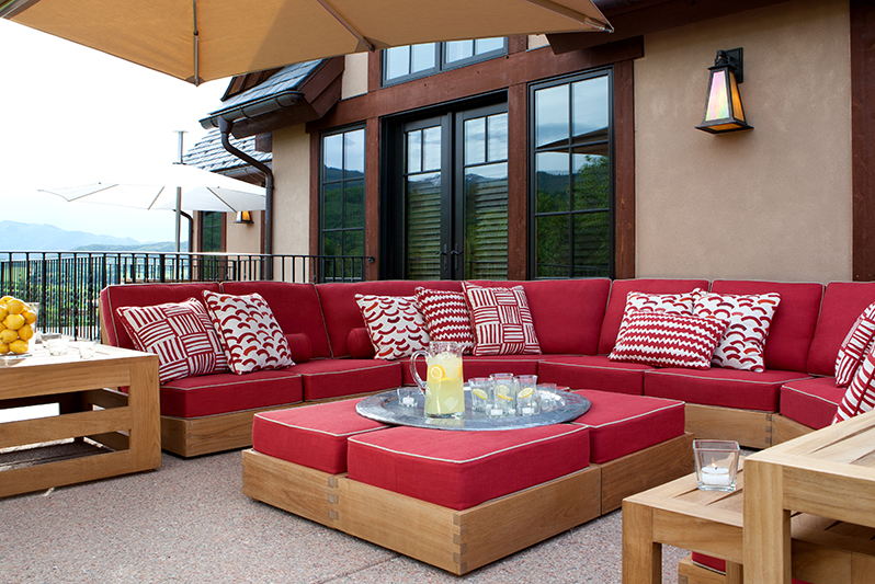 Patio in Aspen Colorado on Buttermilk Mountain with Perennials outdoor fabric and David Sutherland Teak Furniture.